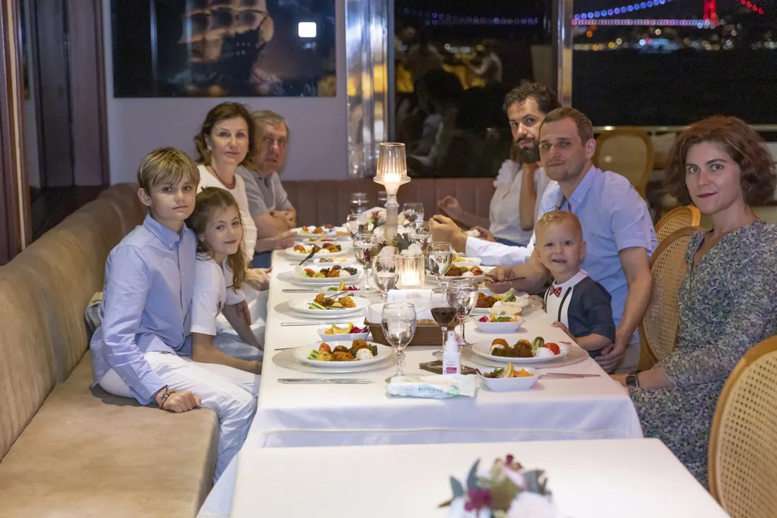 Family birthday dinner table on a yacht