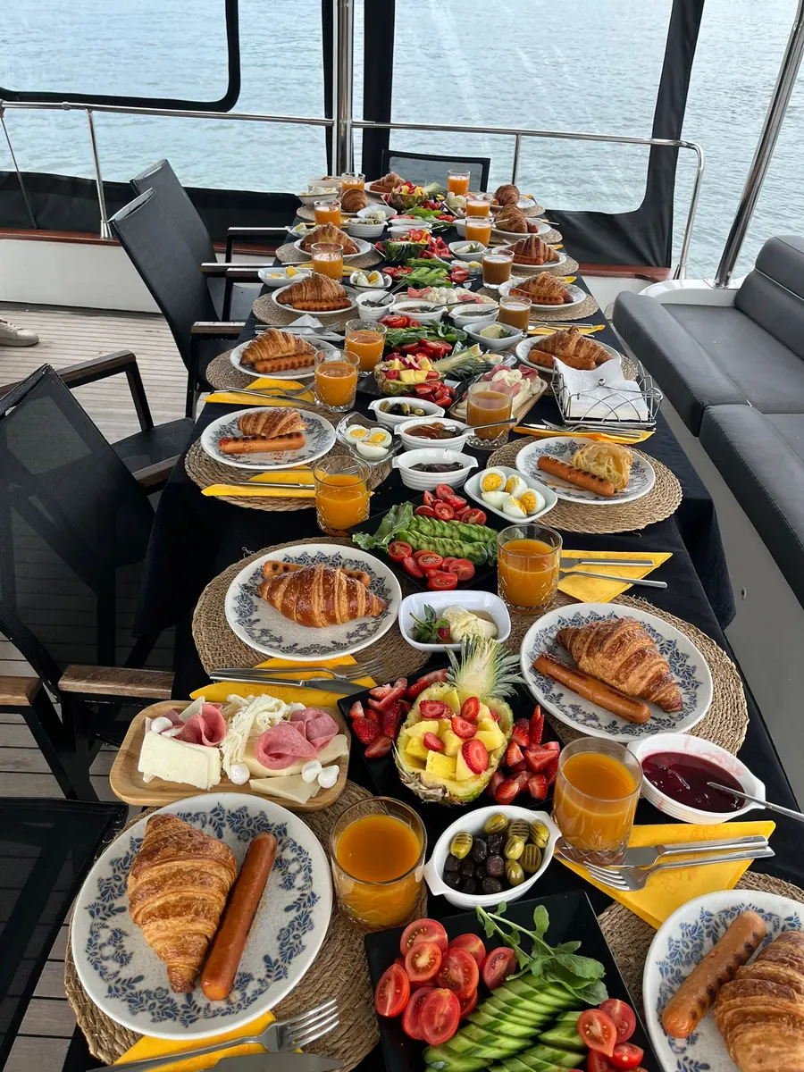 Long Turkish breakfast table set on a private yacht