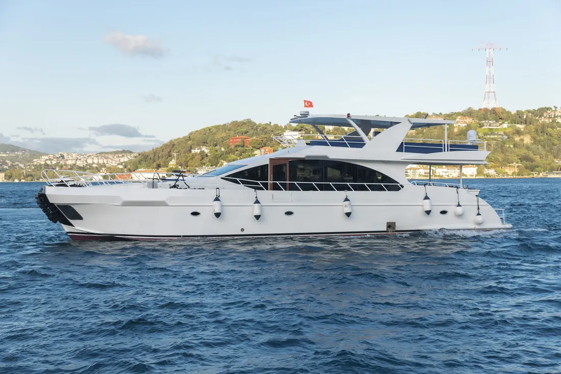 White Istanbul yacht on the Bosphorus in the morning