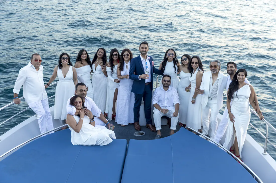 Company white party on the bow of a yacht on the Bosphorus
