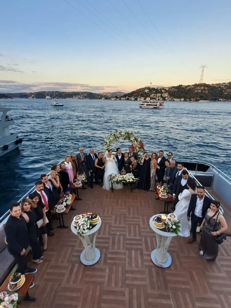 Engagement dinner on a yacht deck at sunset