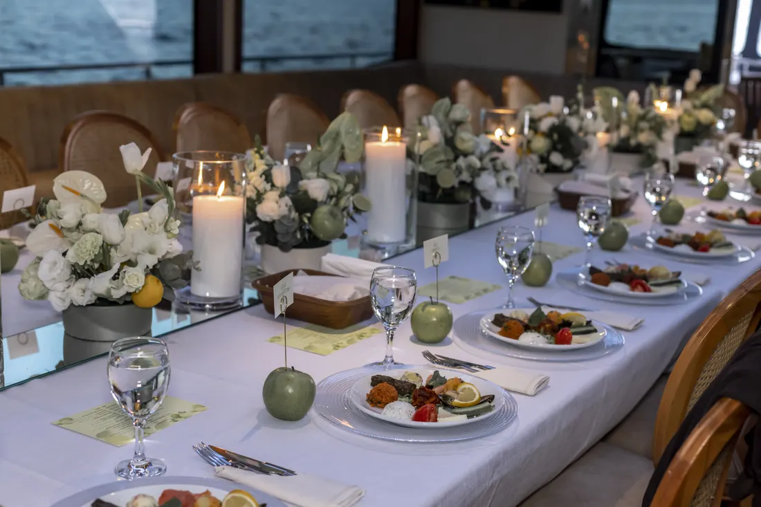 Dinner table set for executives on a yacht