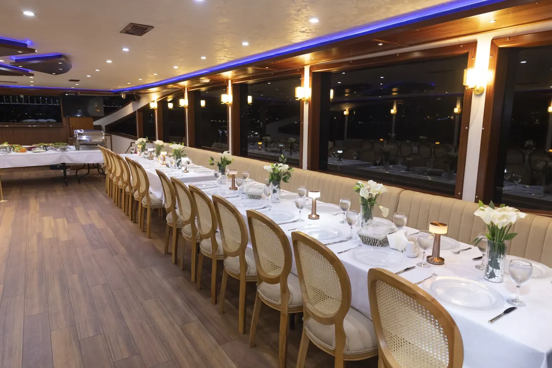 Yacht saloon prepared for an executive dinner