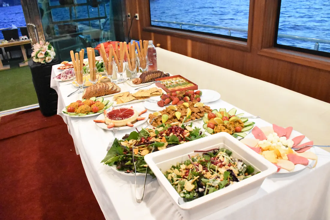 Celebration buffet in a yacht saloon