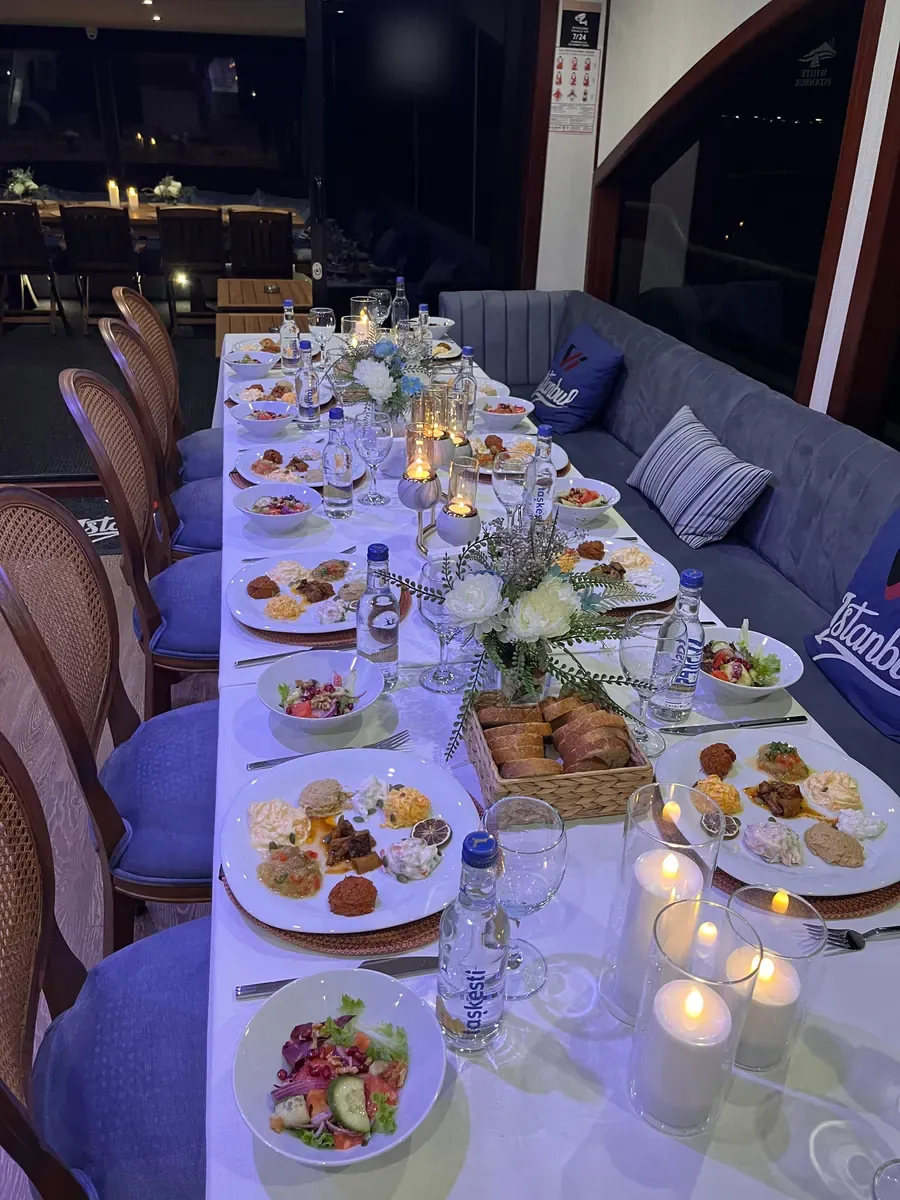 Candlelit New Year's Eve dinner in a yacht saloon