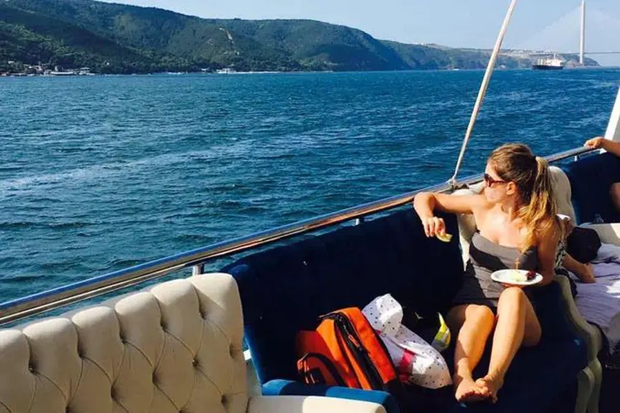 Guests relaxing on the deck of the tour boat