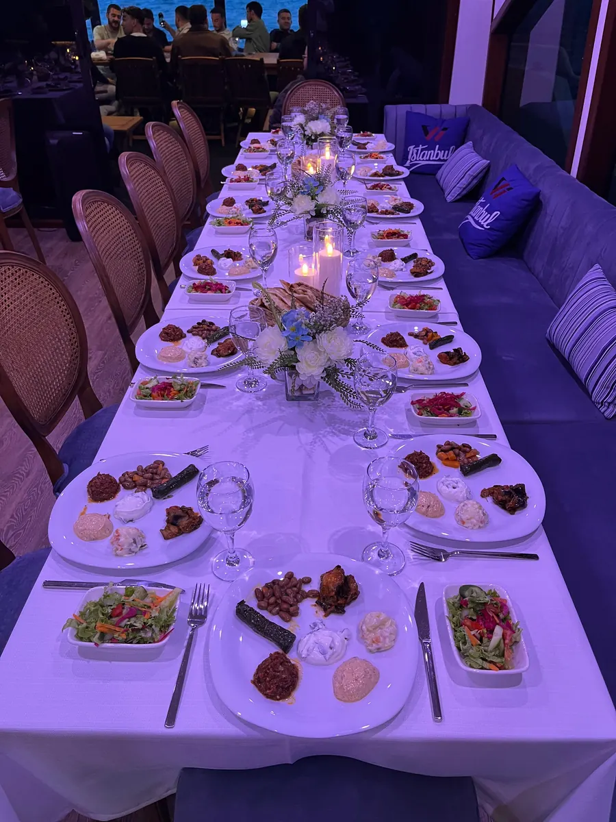 Table of Turkish mezes set for dinner on a yacht