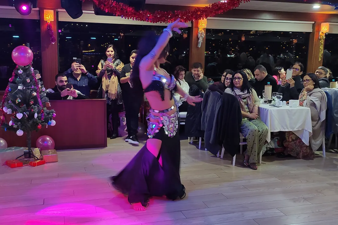 Belly dancer at a New Year's Eve party on a yacht