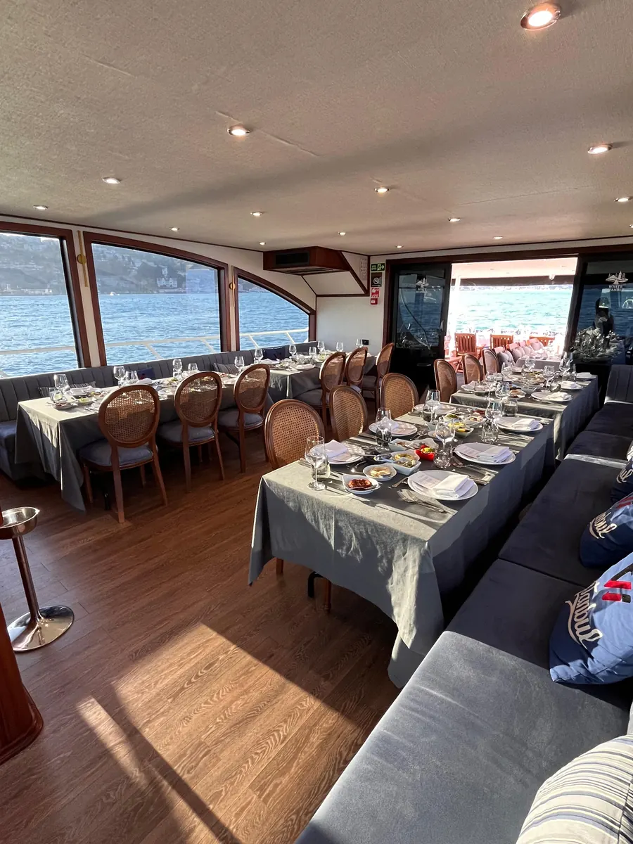 Yacht saloon set for a gala dinner
