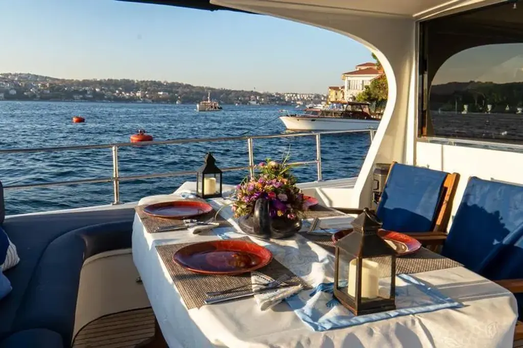 Aft deck table set for dinner on Blue Horizon
