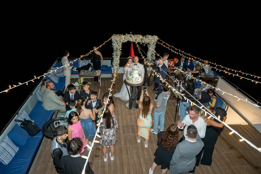 Wedding reception on a yacht deck at night