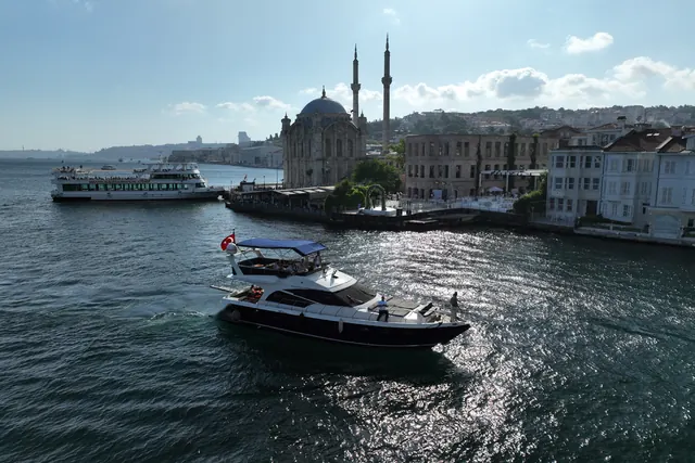 Azure motor yacht by Ortaköy Mosque