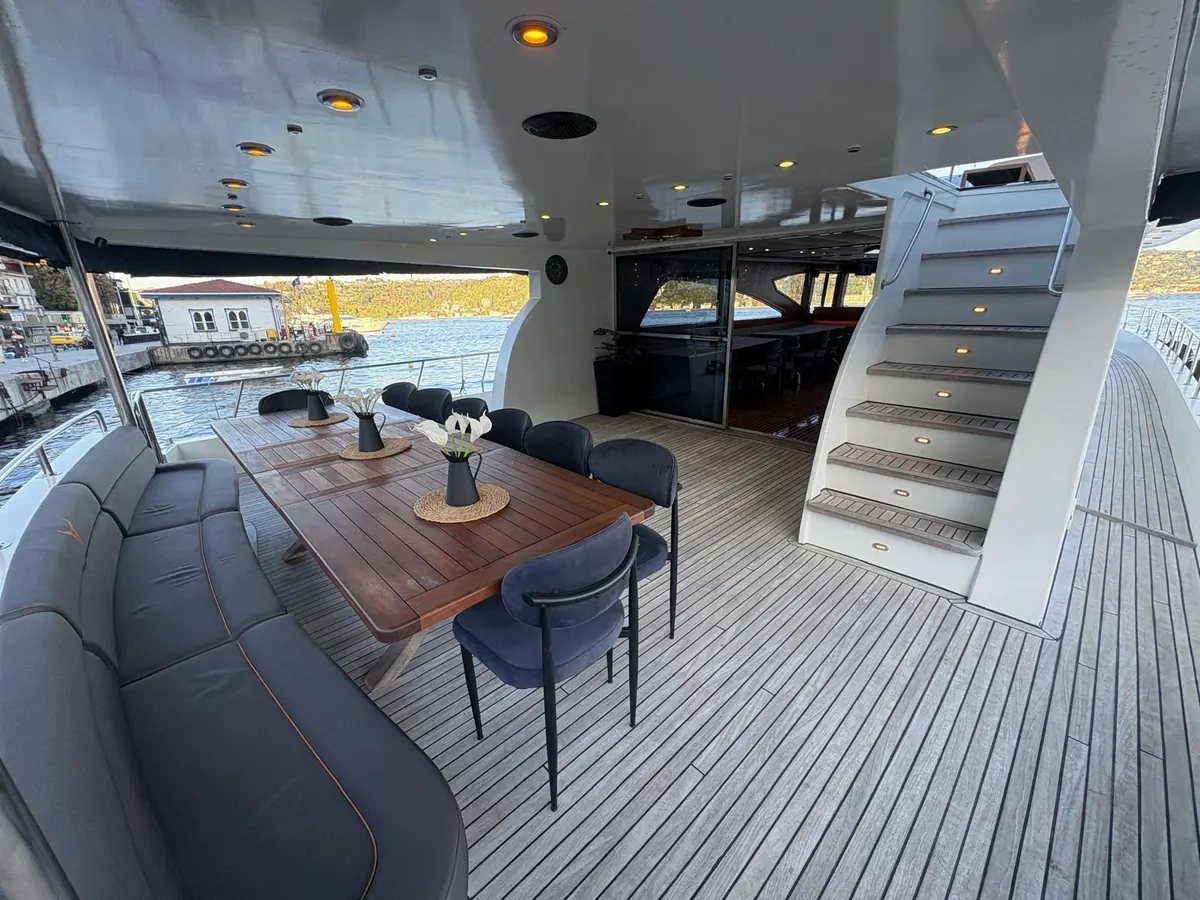 Aft deck with stairs on the Blue Wave yacht