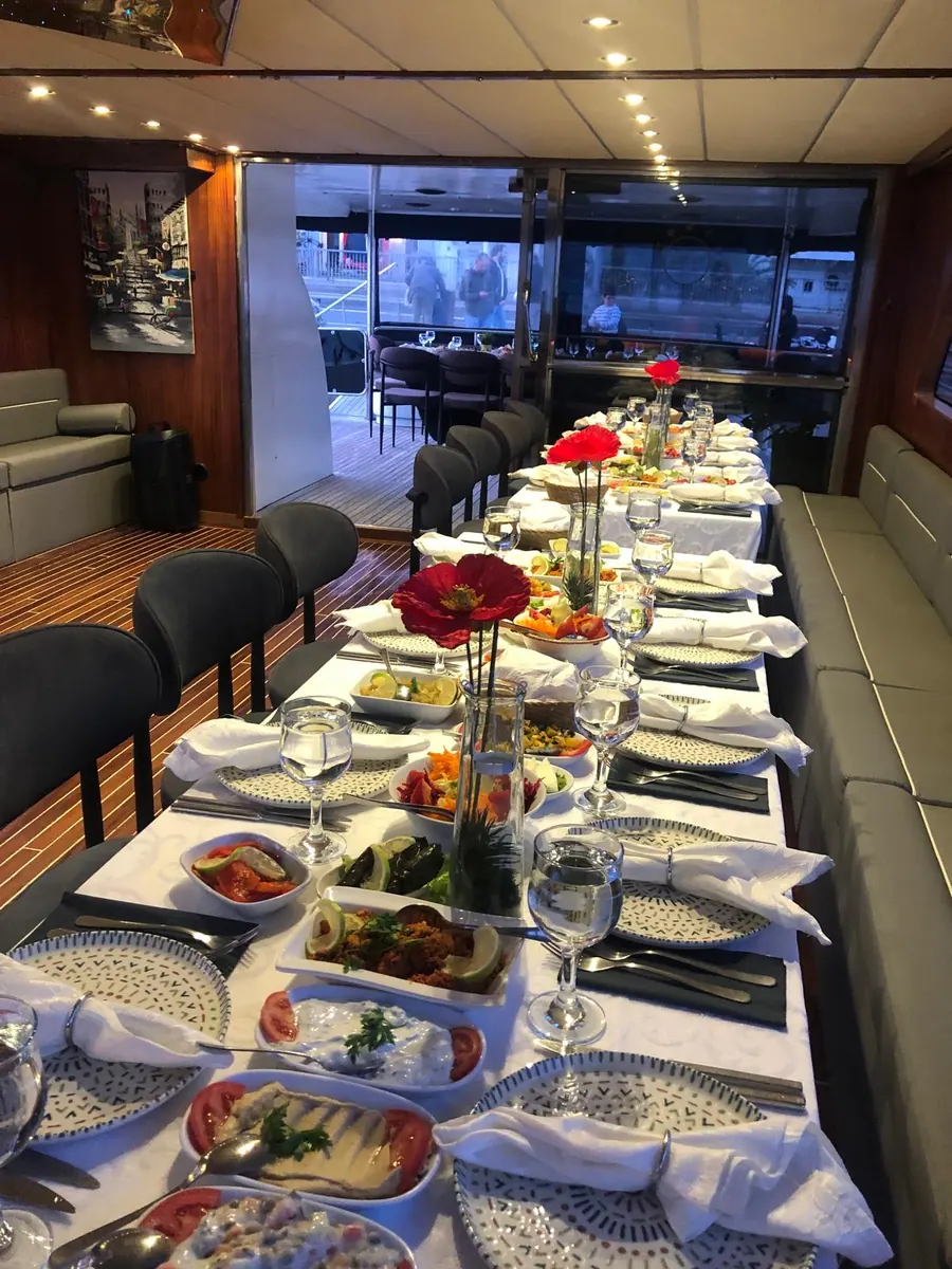 Dinner table set with mezes on Blue Wave
