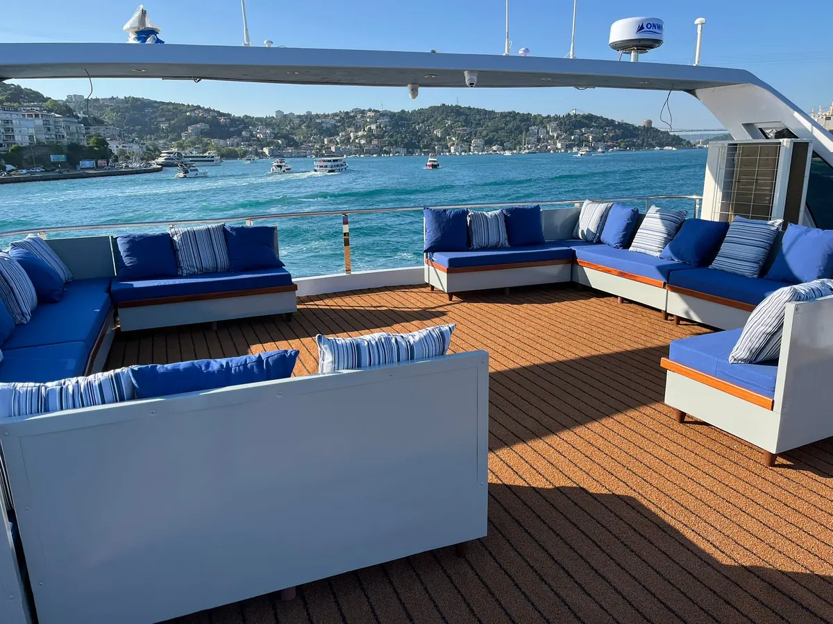 Aft lounge with blue sofas on Crescent Star
