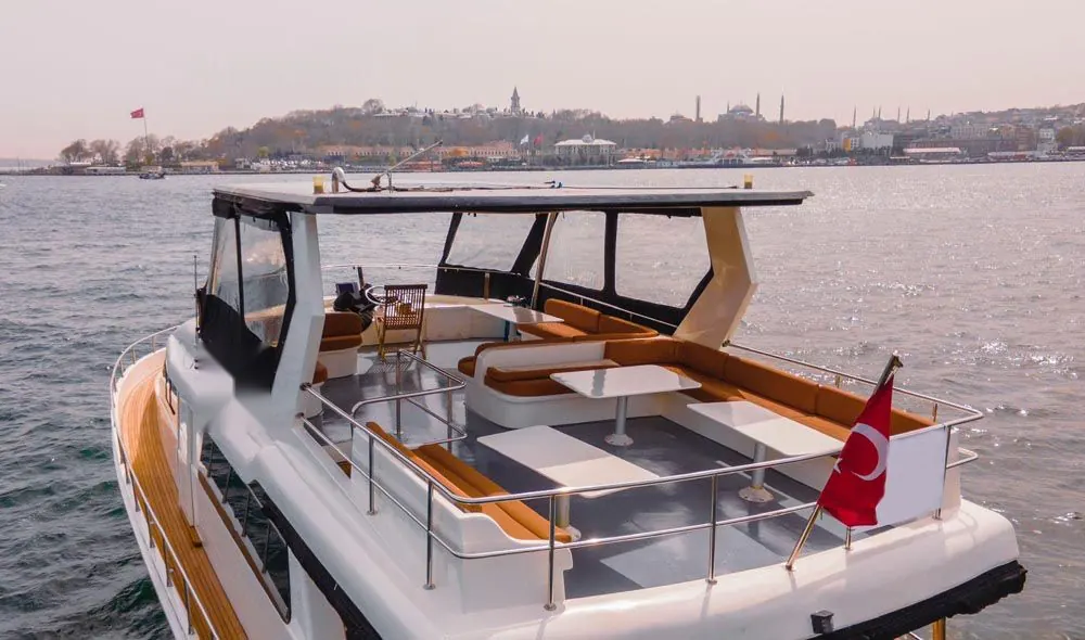 Ocean Breeze flybridge with the old city behind
